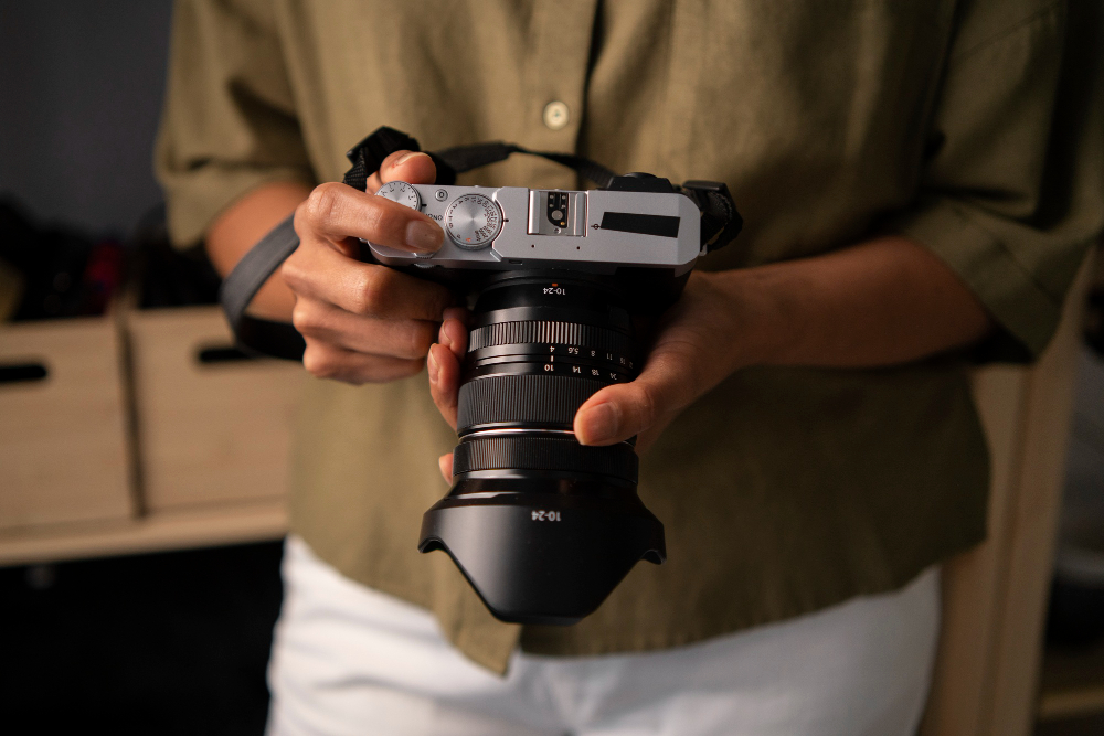 woman holding photo camera